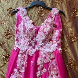 Size 6 Hot Pink Tulle Prom dress with flower appliqué and rhinestones. Unworn